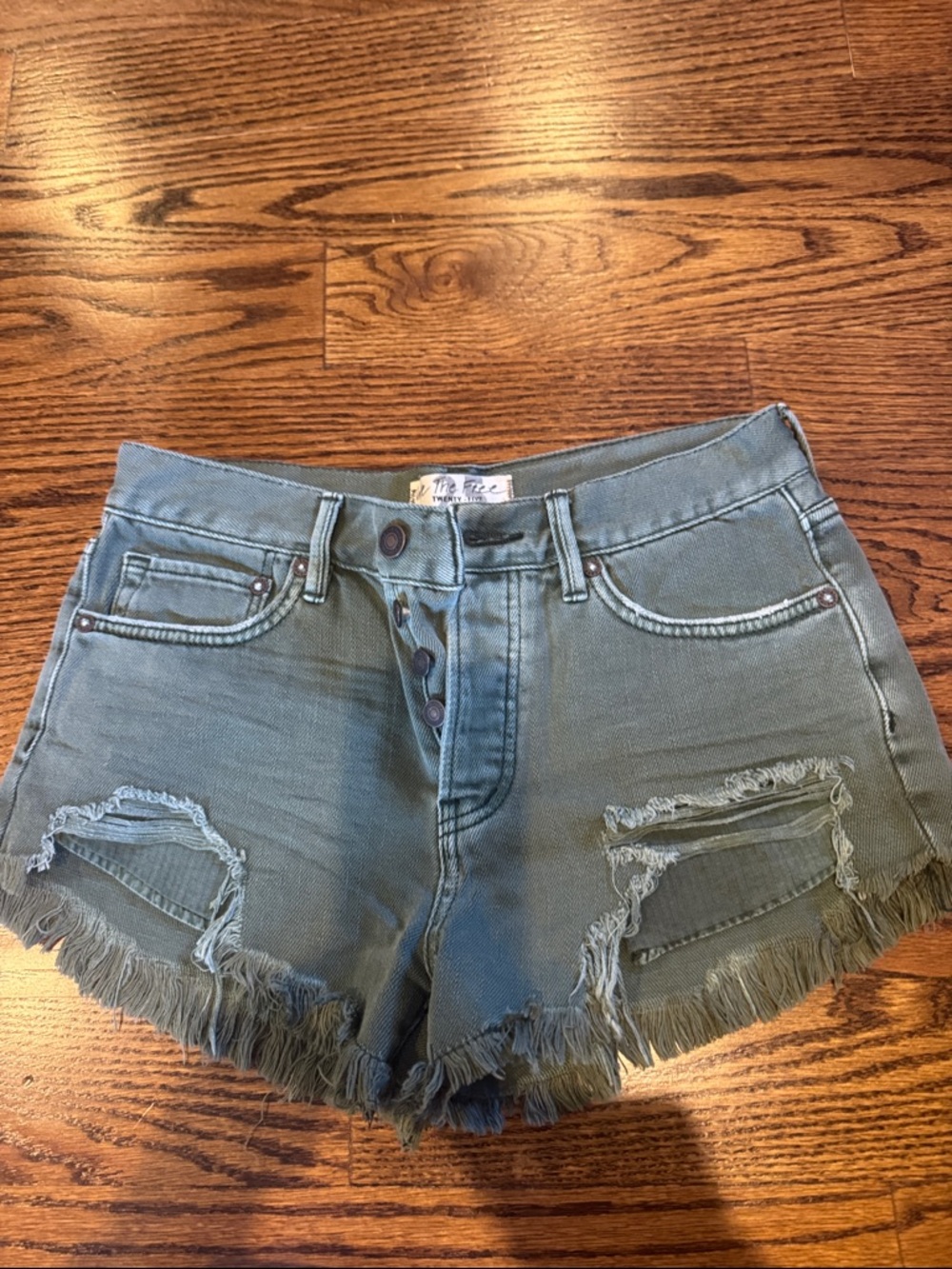 We The Free Olive Distressed High-Rise Frayed Denim Shorts